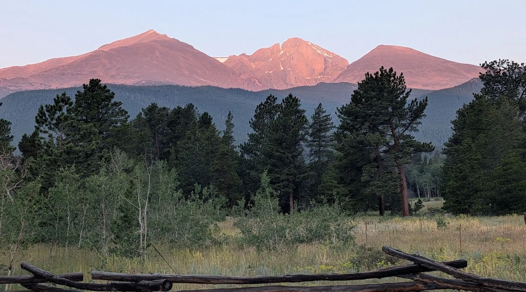 Alpenglow on Longs Peak over a split-rail fence